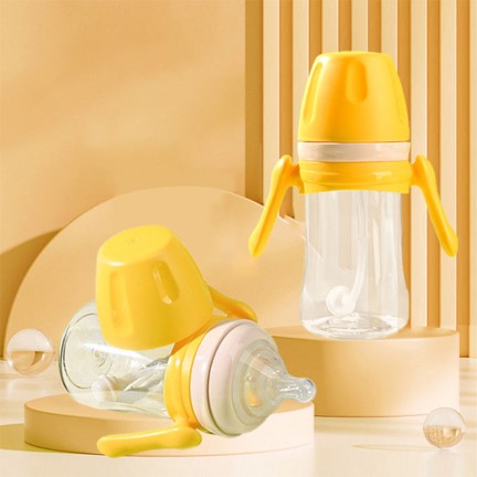Yellow simple silicone pacifier baby bottle