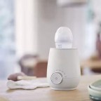 White small and evenly heated milk warmer