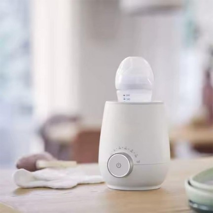 White small and evenly heated milk warmer