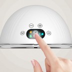 White wearable electric breast pump